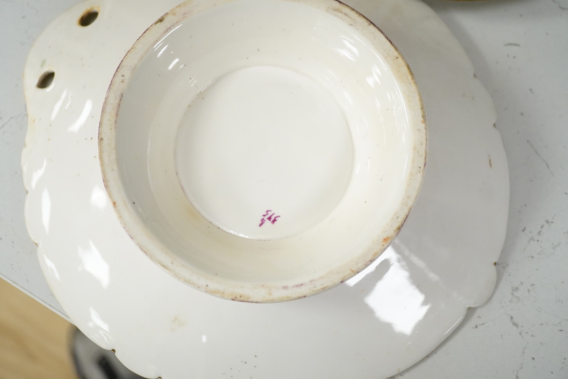 An early 19th century pearlware sprigged jug and four mid 19th century Ridgway flower painted dessert plates